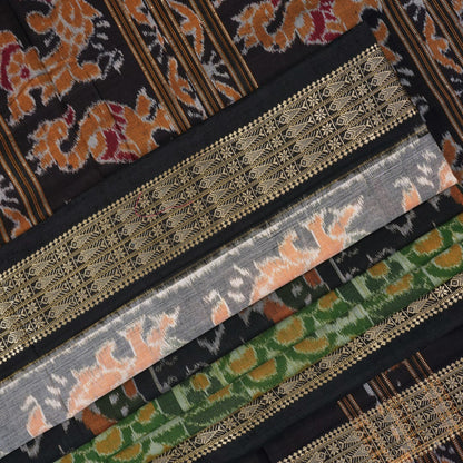 Full layout of green and black Sambalpuri cotton saree showcasing the complete pattern and motifs.