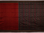 Close-up showing the fine silk texture and intricate motifs of the Sambalpuri saree
