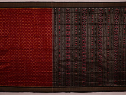 Close-up showing the fine silk texture and intricate motifs of the Sambalpuri saree