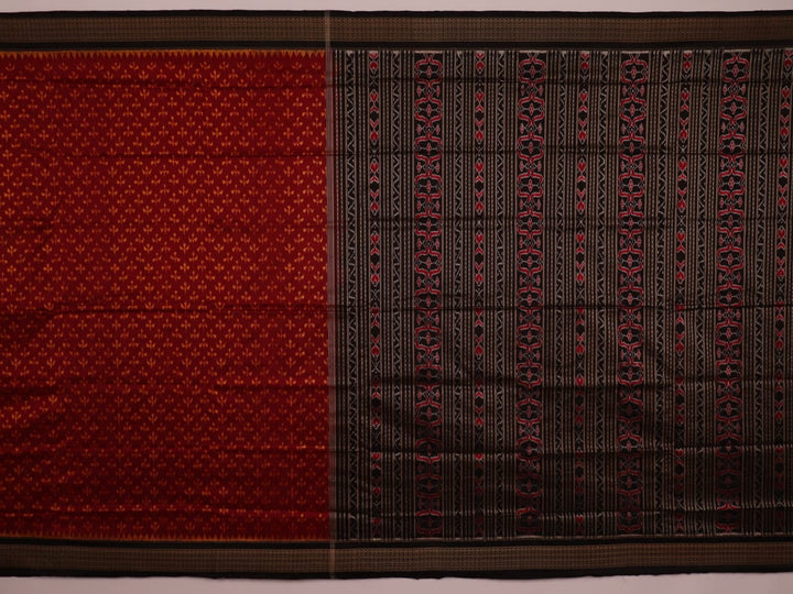 Close-up showing the fine silk texture and intricate motifs of the Sambalpuri saree