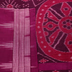 Plain pink and violet Sambalpuri cotton saree elegantly draped.