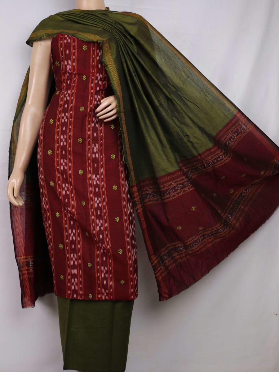 Detail view of the blouse piece with intricate Sambalpuri motifs in maroon and green on cotton fabric.