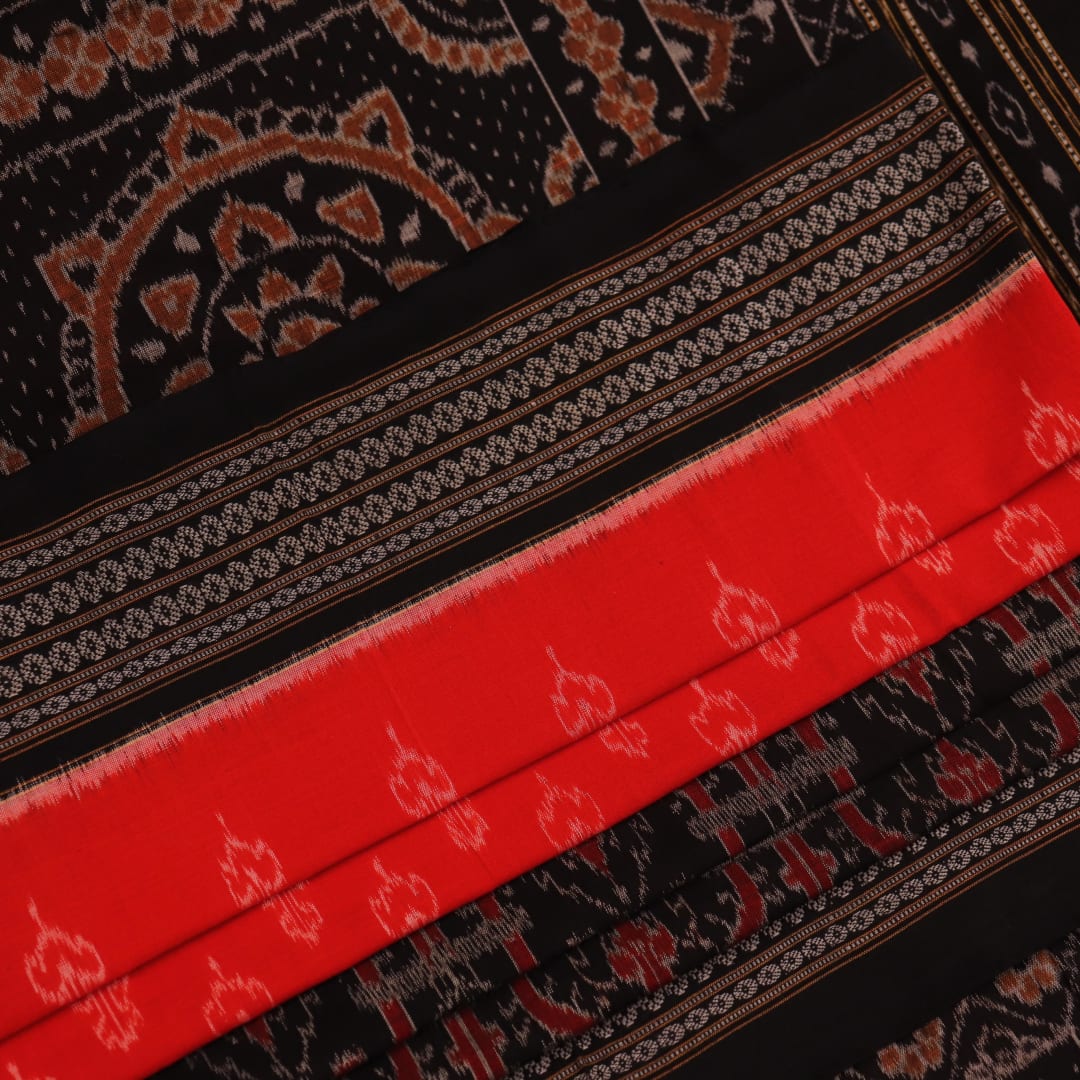 Full view of an orange and black Sambalpuri cotton saree with intricate motifs