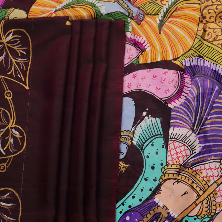 Close-up of a hand-painted silk Patachitra saree, highlighting the vibrant, textured weave and intricate details.