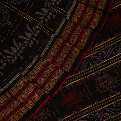 Full view of a black and black cotton Sambalpuri saree with intricate motif patterns.