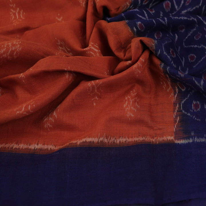 Stylish brown cotton dupatta with blue motifs, draped gracefully on a model