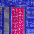 Close-up showing the luxurious handloom silk fabric texture and fine weave of the pink Sambalpuri saree.