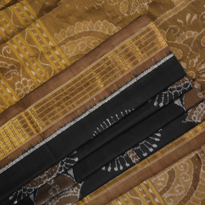 Close-up revealing the delicate, lustrous texture of the black silk tissue saree fabric with subtle sheen.