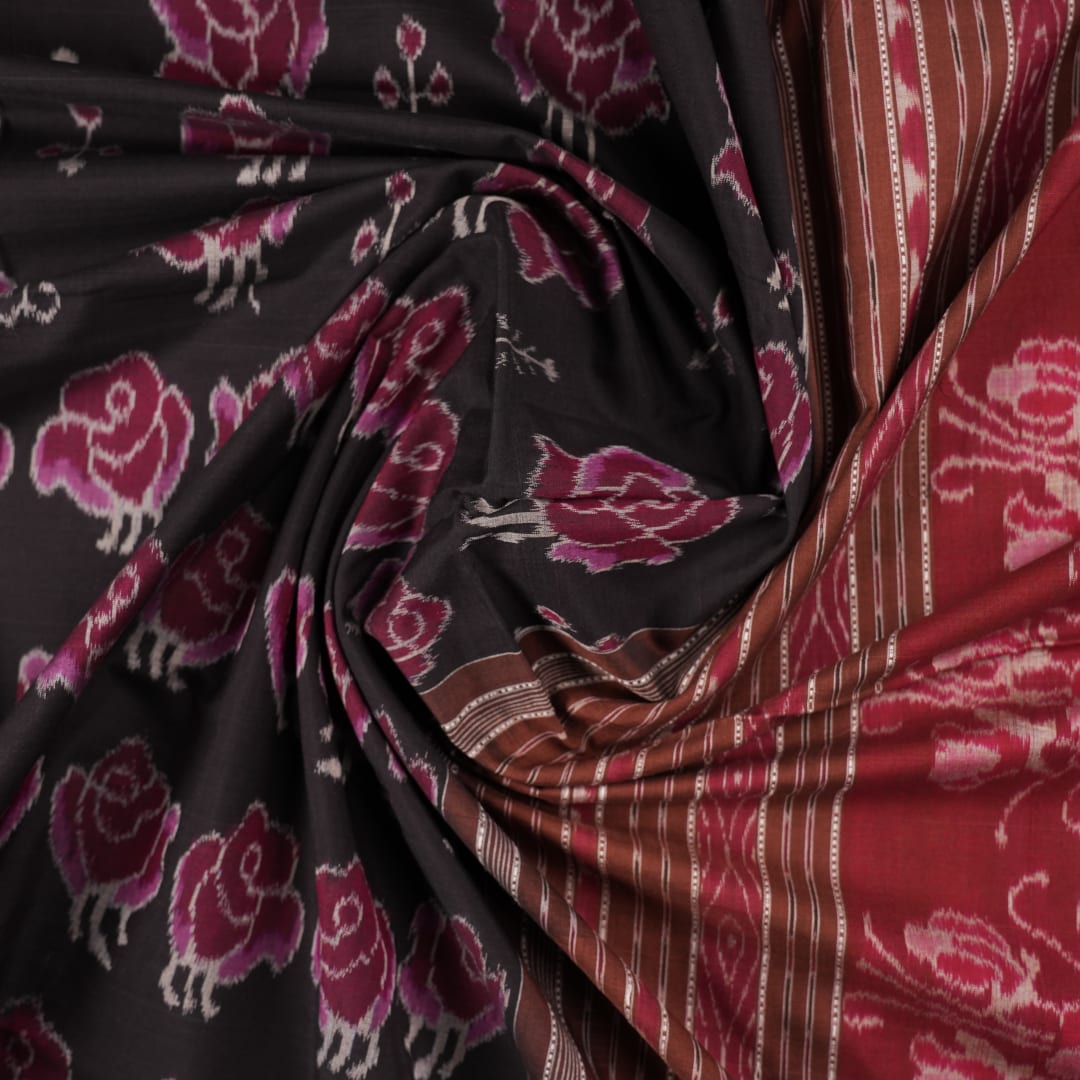 Full layout of the black and brown Sambalpuri cotton saree displaying motifs across the body and pallu.