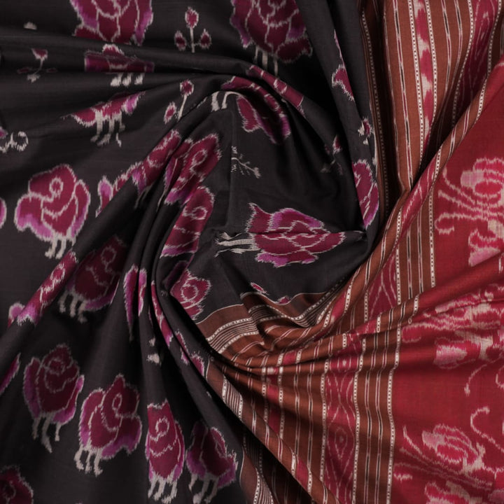 Full layout of the black and brown Sambalpuri cotton saree displaying motifs across the body and pallu.