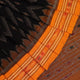 Black and yellow cotton Sambalpuri saree with motifs, styled and draped elegantly