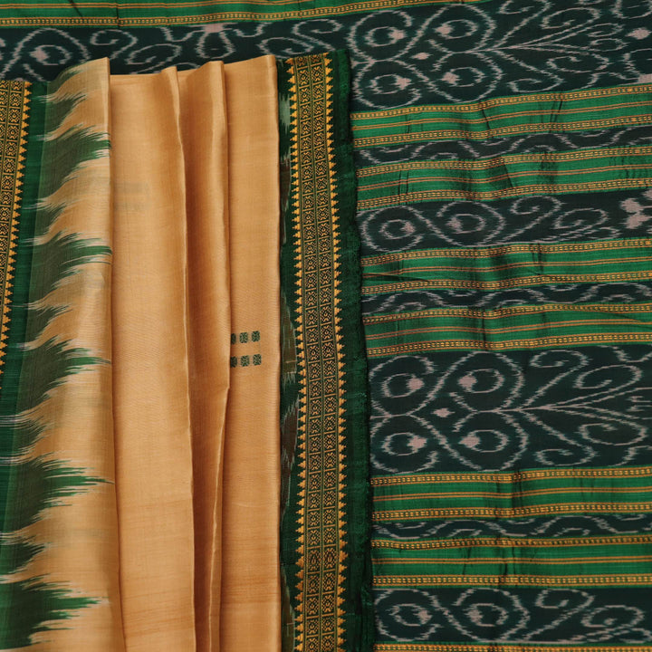 Off-white silk Khandua saree draped over a model, showcasing its intricate butta pattern and green accents.