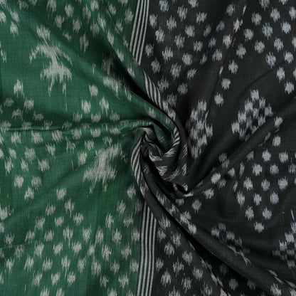 Elegant model draping a green and black Sambalpuri cotton saree with traditional Odisha handloom motifs.