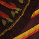 Full view of a brown and brown Khandua silk saree with intricate motif pattern.