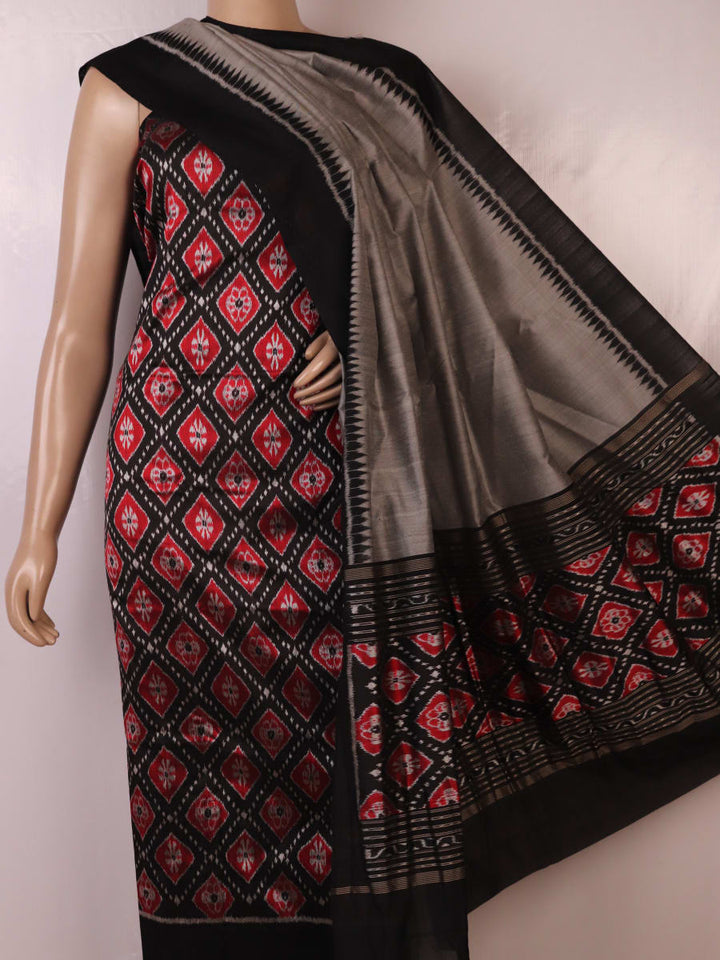 Detail of black and grey Sambalpuri Silk Dress Material blouse piece with motifs.