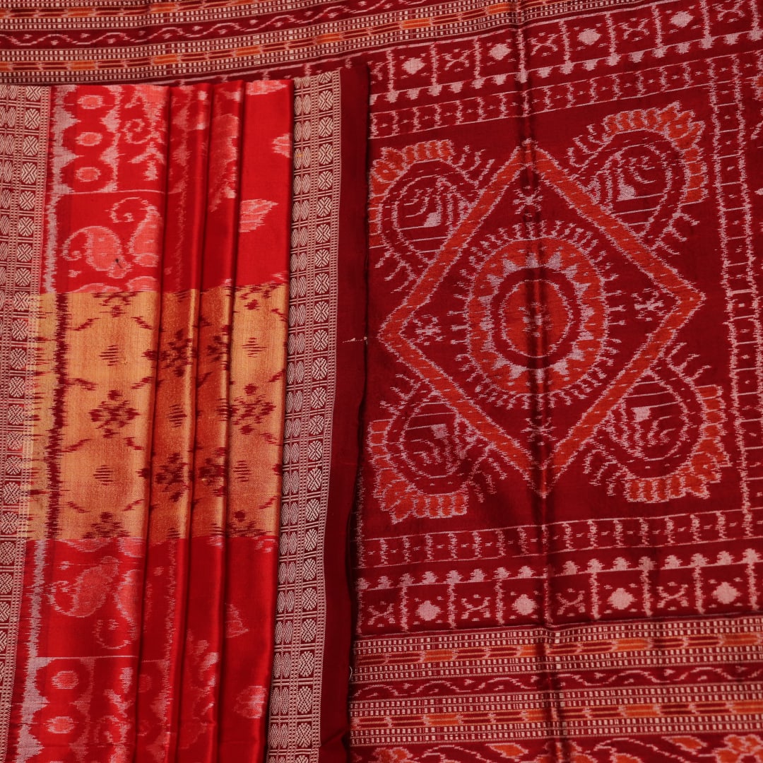 Close-up showcasing the fine texture of the silk material used in the Sambalpuri saree.