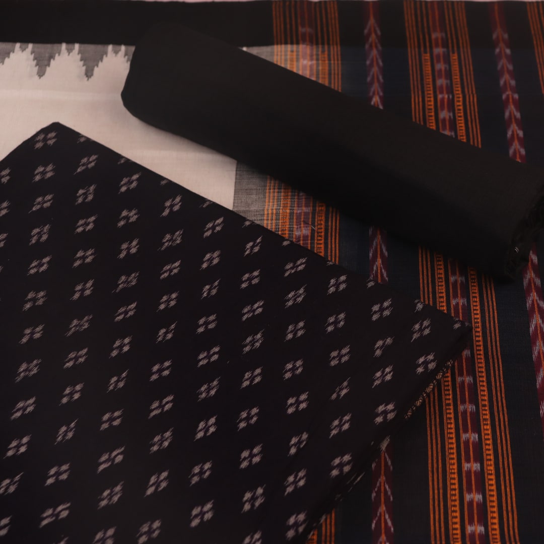 Detail of the black Sambalpuri cotton dress material's matching blouse piece with motifs.
