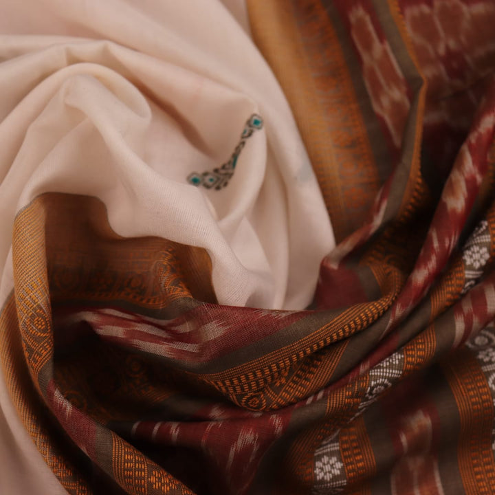 Full view of an elegant white cotton Bomkai handloom saree featuring a brown butta pattern.