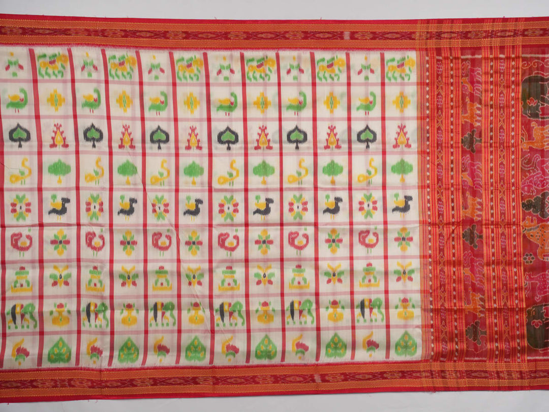 Model styled in a white and red Khandua silk saree showcasing its elegant fall and traditional Odia motifs.