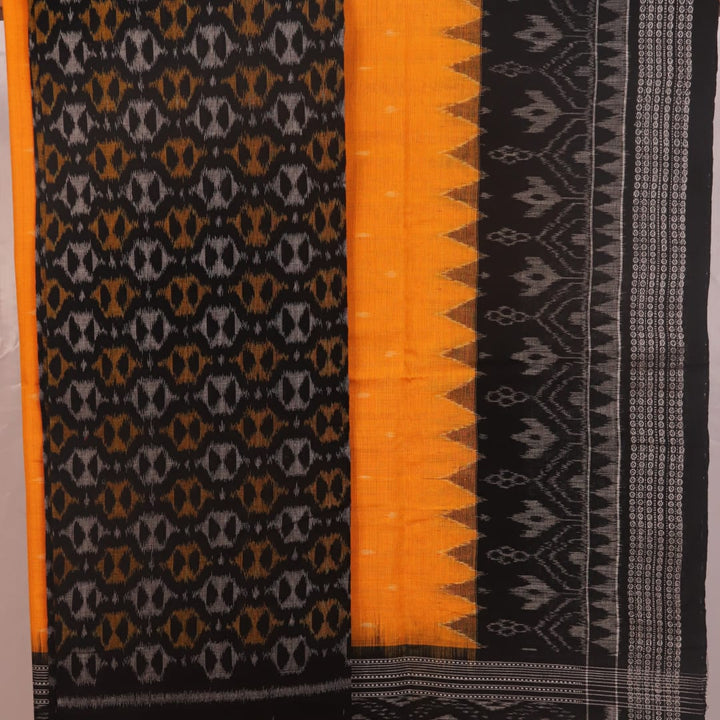 Detail of black and yellow Sambalpuri cotton dress material blouse piece with motifs.