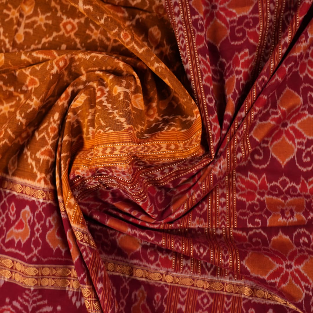 Complete flat layout of the brown and maroon Sambalpuri cotton saree showcasing all patterns and motifs.