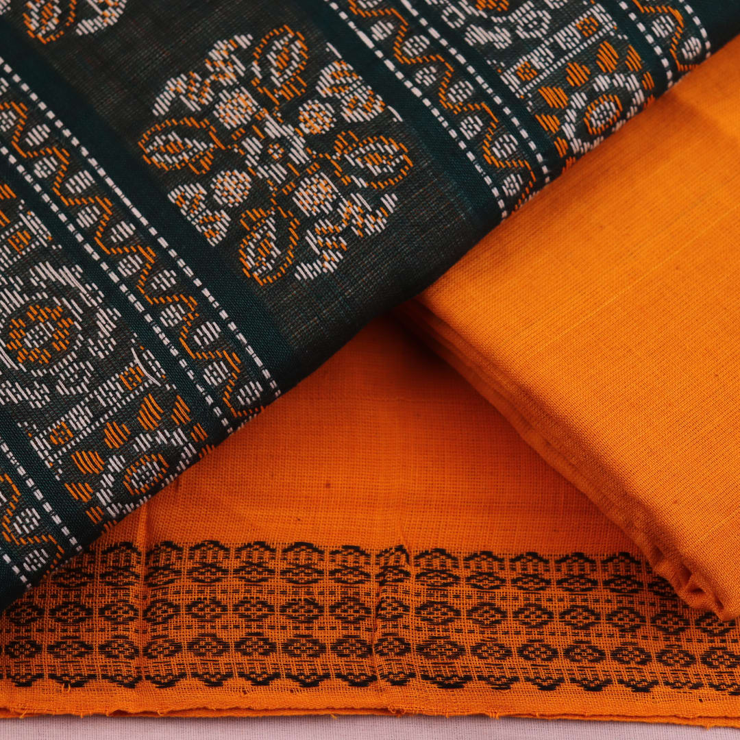 Bomkai Cotton dress material blouse piece in yellow, complementing the green and butta patterns.