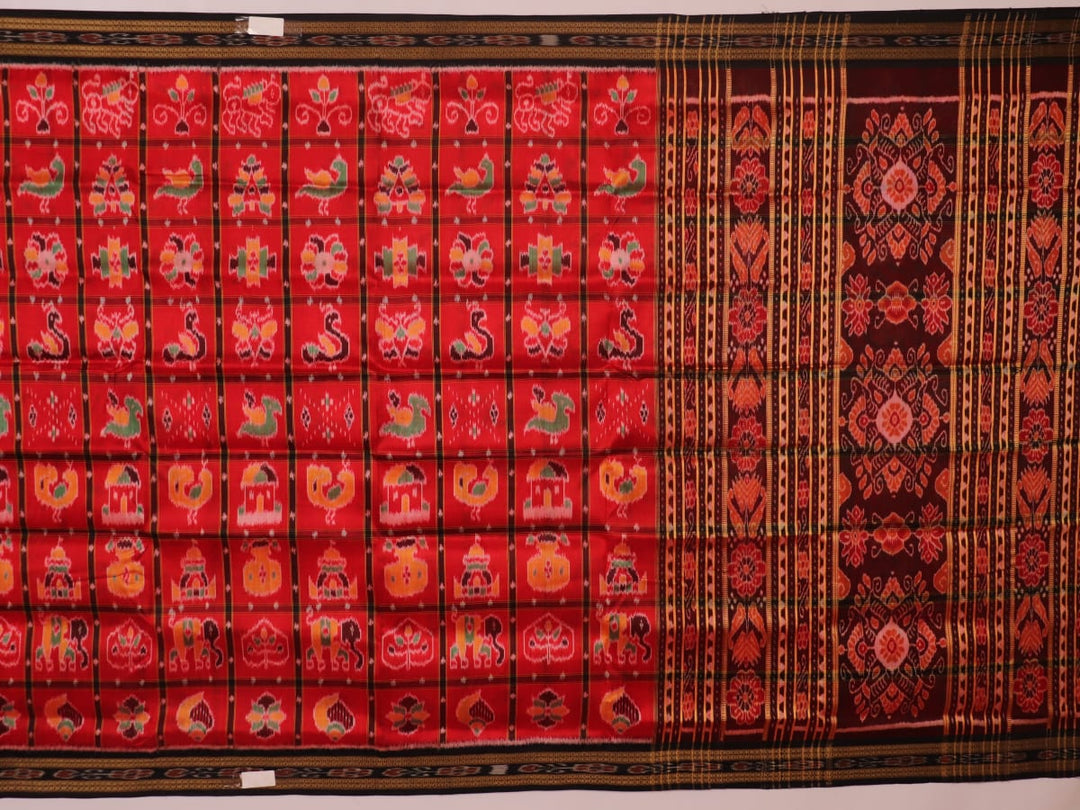 Red and black silk Khandua saree with Nabakothi pattern, styled or draped view showing the overall look.