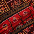 Red and black silk Khandua saree with Nabakothi pattern, styled or draped view showing the overall look.