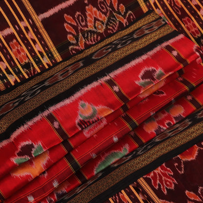 Red and black silk Khandua saree with Nabakothi pattern, styled or draped view showing the overall look.