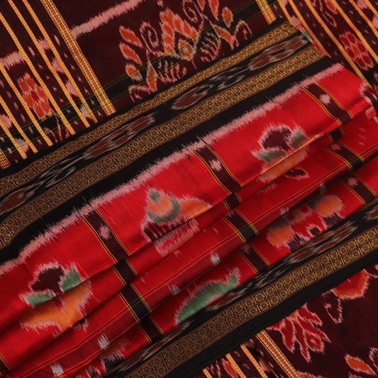 Red and black silk Khandua saree with Nabakothi pattern, styled or draped view showing the overall look.