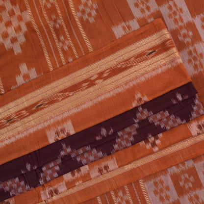 Model draped in a maroon and brown Sambalpuri cotton saree showcasing traditional Odisha handloom style.