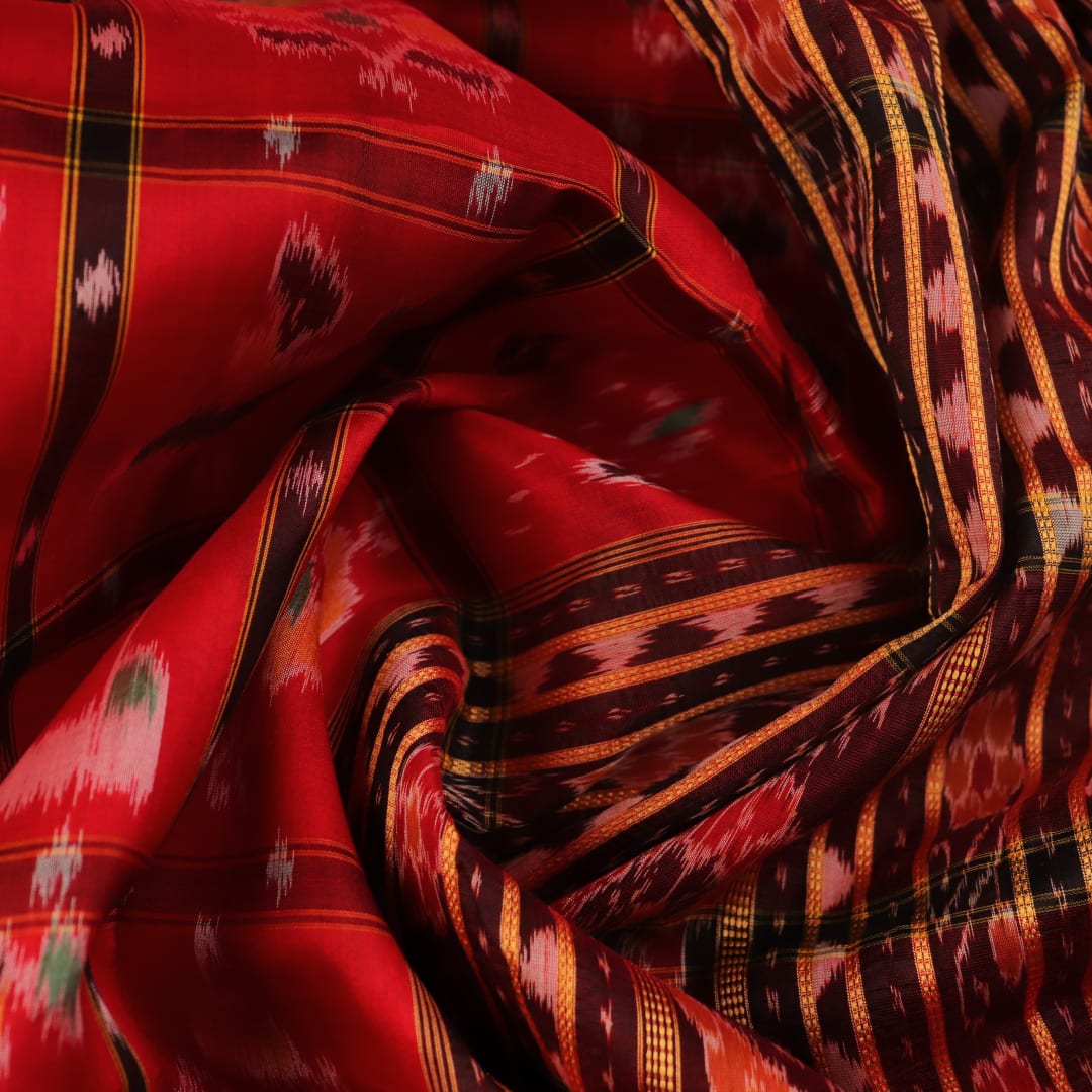 Red and black silk Khandua saree with Nabakothi pattern, styled or draped view showing the overall look.