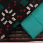 Detail of black cotton Sambalpuri dress material blouse piece with green Pasapalli pattern.