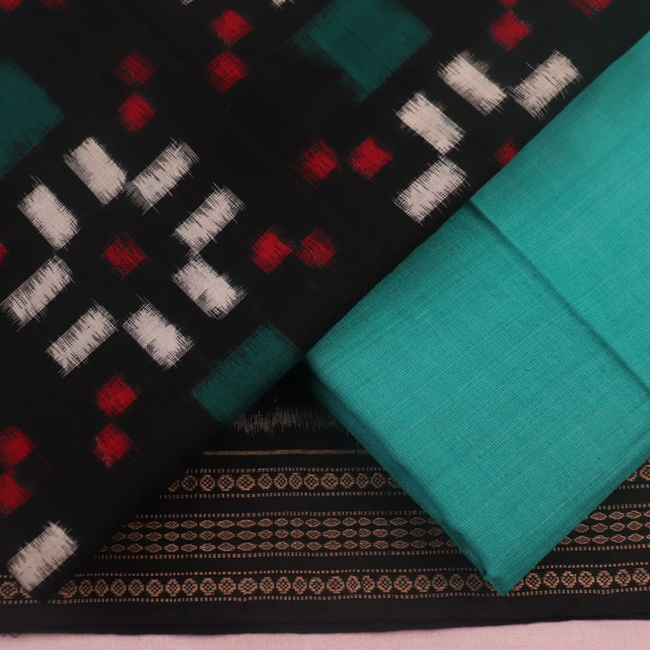 Detail of black cotton Sambalpuri dress material blouse piece with green Pasapalli pattern.