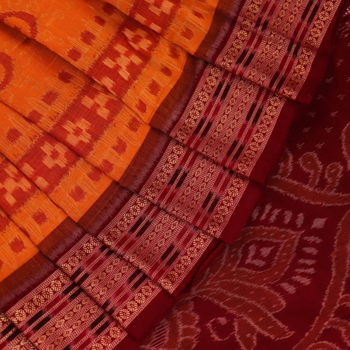 Full view of a vibrant yellow cotton Sambalpuri saree with maroon motifs and intricate border design