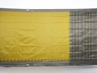 Close-up of the luxurious yellow Sambalpuri silk fabric, showing its fine weave and texture.