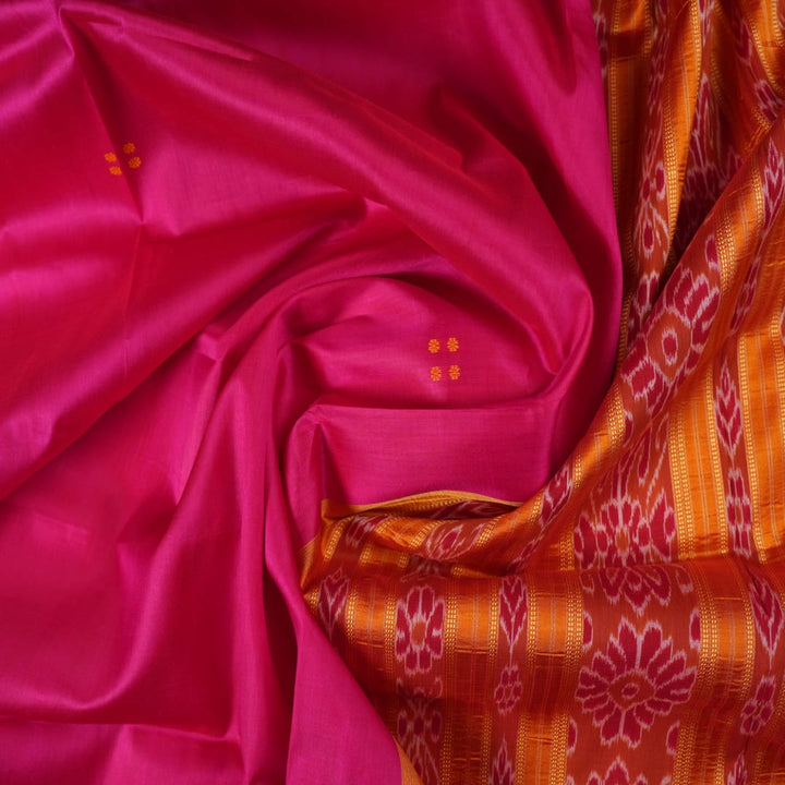 Model wearing a pink and yellow Khandua silk saree with butta work, styled in a traditional drape.