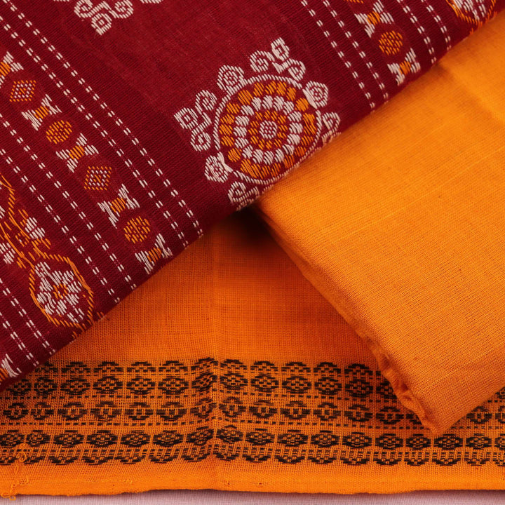 Bomkai cotton dress material blouse piece in maroon, featuring a subtle butta pattern.