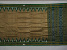 Elegant styling of a brown and green Khandua silk saree with butta work as draped on a model.