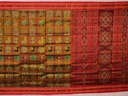 Green Khandua silk saree styled and draped to showcase the Nabakothi pattern, a traditional handloom saree.