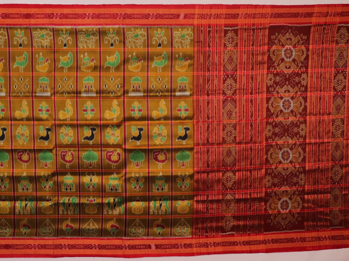 Green Khandua silk saree styled and draped to showcase the Nabakothi pattern, a traditional handloom saree.