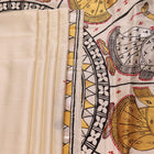 Close-up of white silk Patachitra saree, showcasing the handloom fabric's texture and subtle paint details.