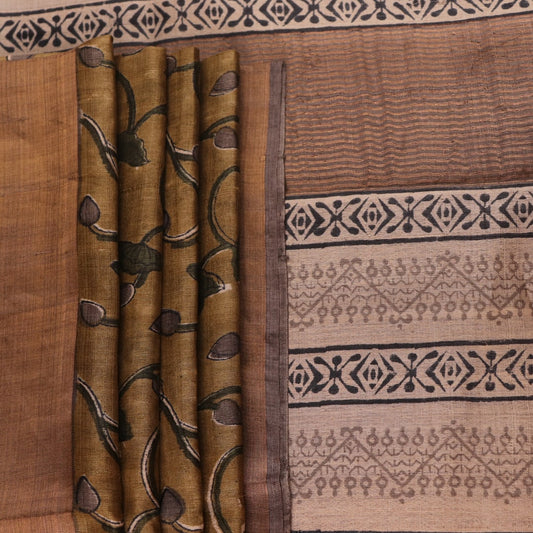Close-up of printed multi-color handloom Tussar silk saree fabric texture.