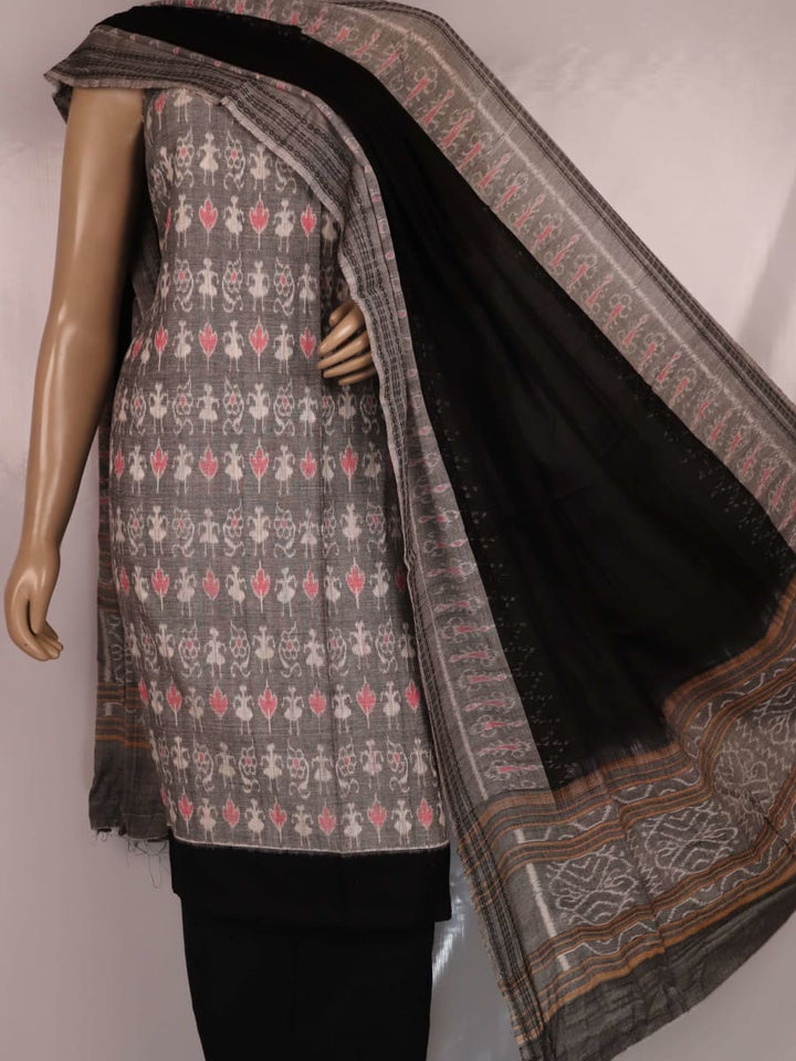 Close-up showcasing geometric motifs and black-on-grey color combination of a Sambalpuri cotton dress material blouse piece