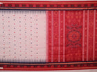 Full view of a white and red Sambalpuri cotton saree with butta pattern.