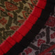 Green and black Sambalpuri cotton saree with motifs, elegantly draped for styling.