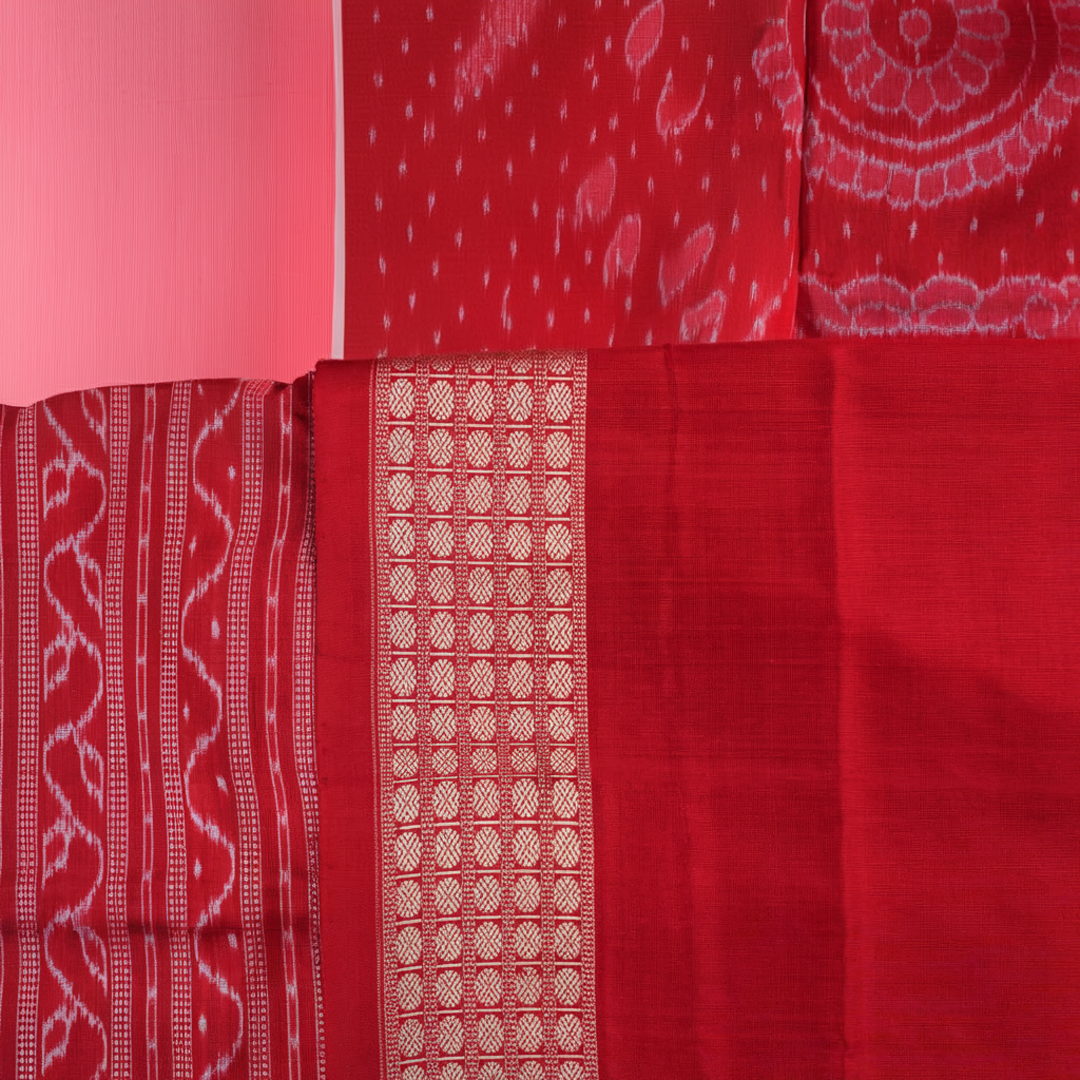 Close-up of the rich, smooth texture of the black Sambalpuri silk saree fabric.