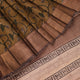 Close-up of printed multi-color handloom Tussar silk saree fabric texture.