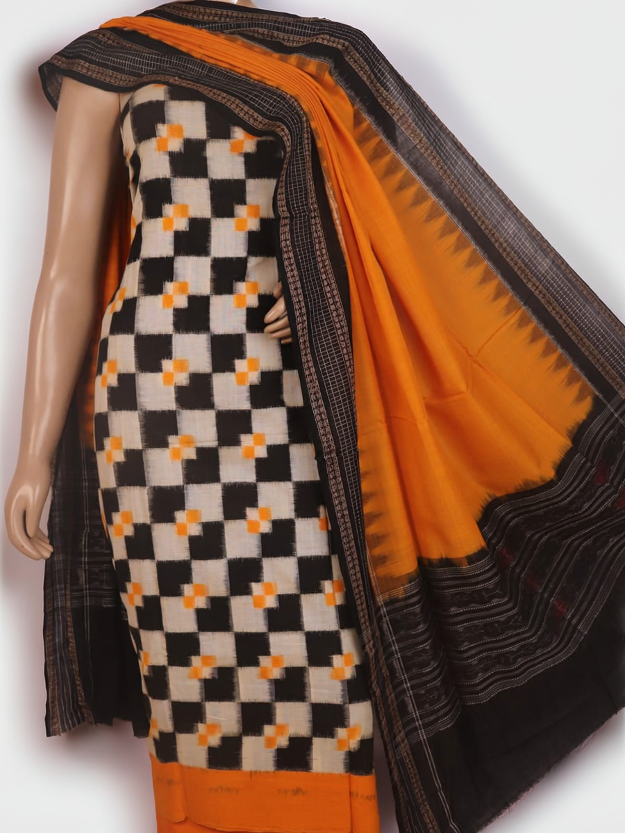 Detail of the white and yellow Sambalpuri cotton dress material blouse piece, showing motifs.