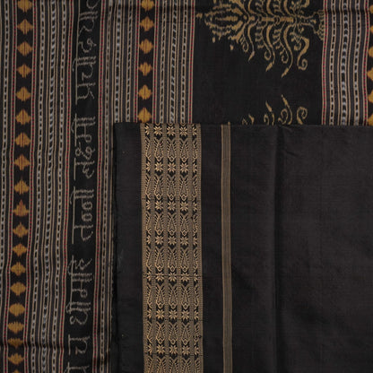 Micro close-up of the maroon Sambalpuri silk fabric, revealing its luxurious texture and handloom weave.